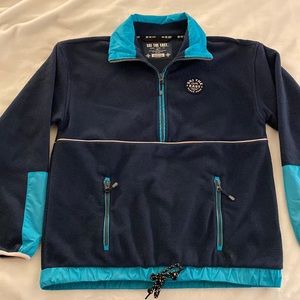 Ski the East 1/4 zip in blue with pink trim
